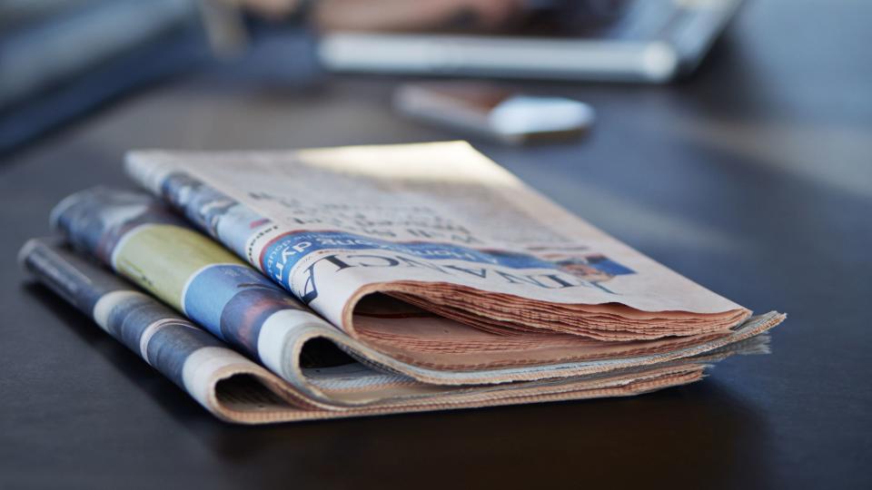 newspaper on a work desk