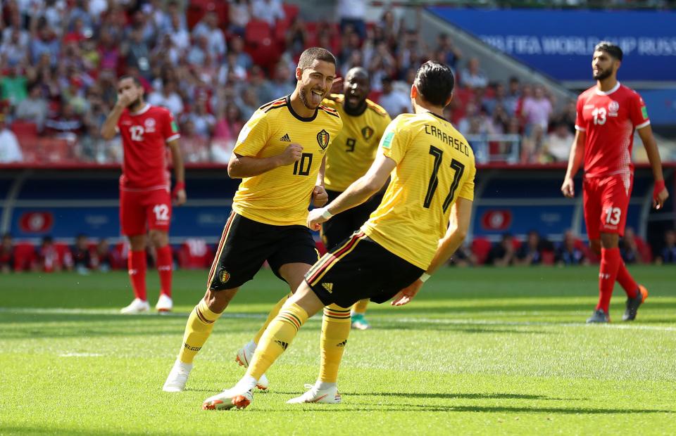 Eden Hazard celebrates after slotting home the opener from the penalty against Tunisia