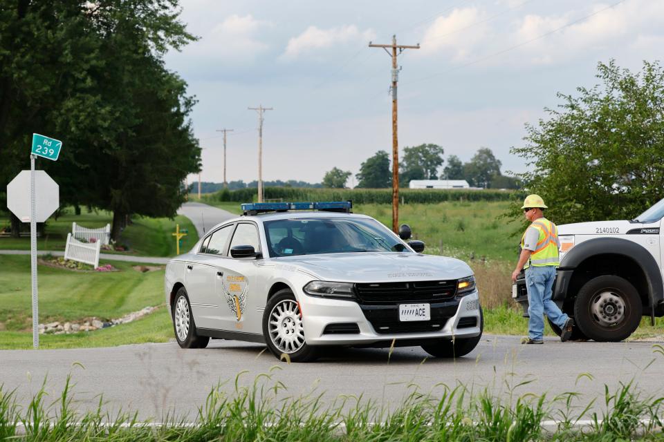 The scene in Clinton County, Ohio, near where an armed man was shot and killed after police say he tried to breach the FBI's Cincinnati field office Thursday, Aug. 11, 2022.