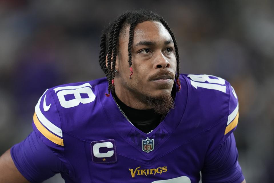 Minnesota Vikings' Justin Jefferson warms up before an NFL football game against the Green Bay Packers Sunday, Dec. 31, 2023, in Minneapolis. (AP Photo/Abbie Parr)