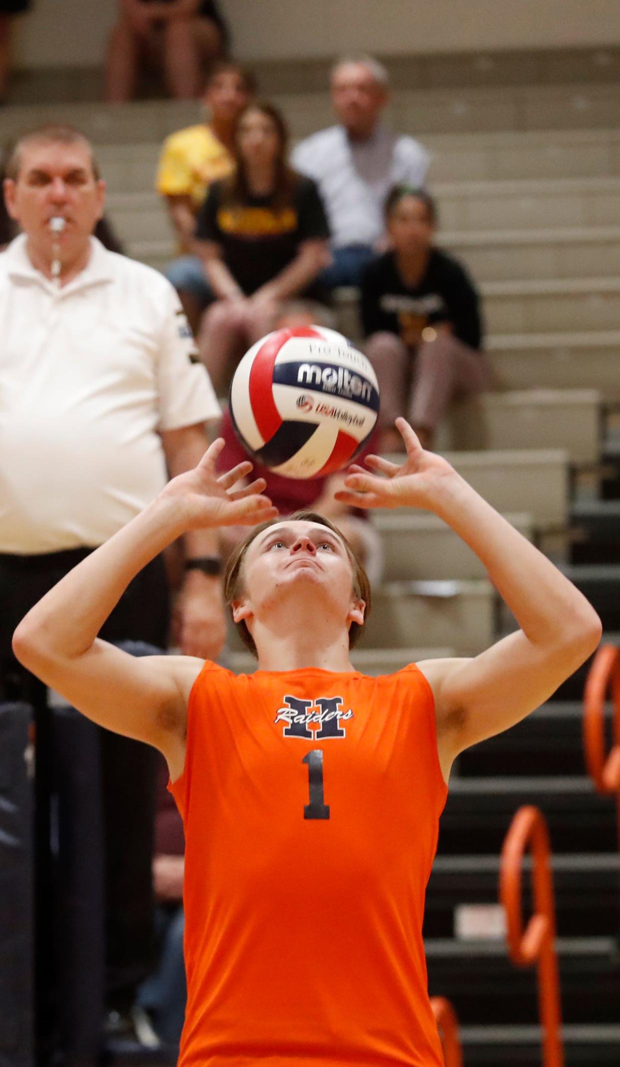 Harrison Raiders Bennett Robison (1) sets the ball during the IHSAA boys volleyball sectional championship against the McCutcheon Mavericks, Saturday, May 13, 2023, at Harrison High School in West Lafayette, Ind. Harrison won 3-1.