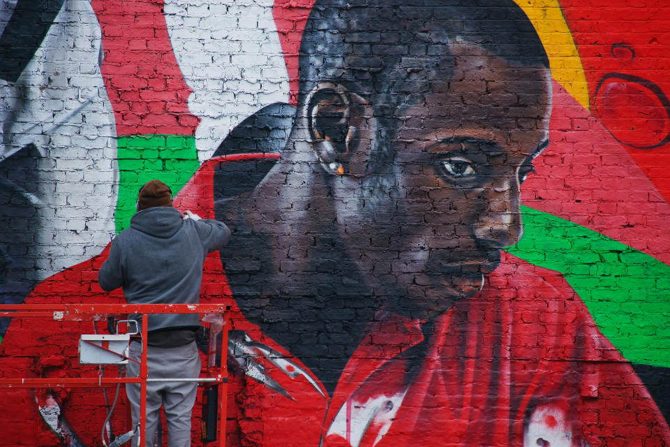 LONDON, ENGLAND - FEBRUARY 16: In this handout image provided by Coca Cola, artist Sam Bates works on the Beat Wall in advance of the launch of the Coca-Cola Move to the Beat campaign for the London 2012 Olympic Games, in the shadow of the Olympic Stadium on January 20, 2011 in London, England. Coca Cola is launching the campaign in 11 countries. (Coca-Cola via Getty Images)