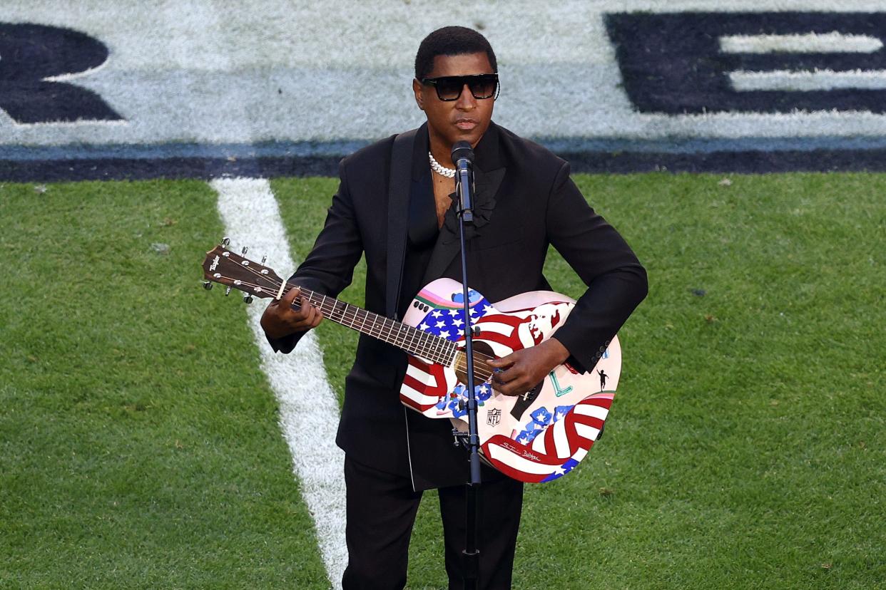 Babyface sang "America the Beautiful," accompanying himself on a painted acoustic guitar.