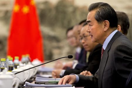 Chinese Foreign Minister Wang Yi speaks during his meeting with U.S. Secretary of State John Kerry at the Ministry of Foreign Affairs in Beijing January 27, 2016. REUTERS/Jacquelyn Martin/Pool