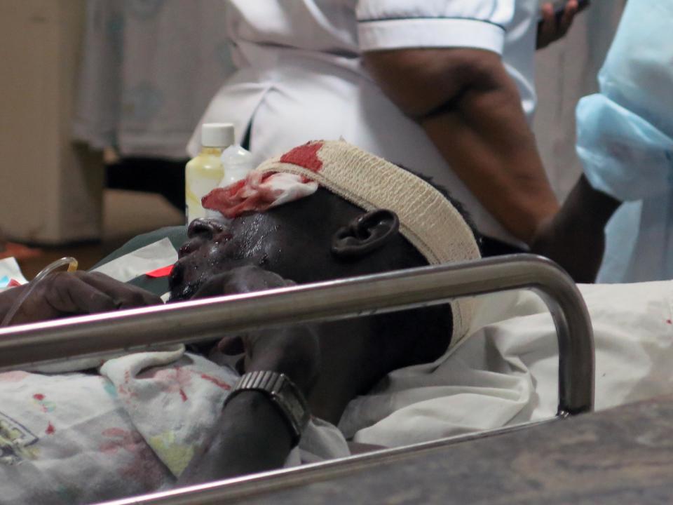 An injured Kenyan receives medical treatment at Kenyatta National Hospital in Nairobi, Kenya, March 31, 2014, after an explosion in Nairobi killed at least five people. The National Disaster Operation Center said on Twitter that explosions had occurred Monday evening in a neighborhood known for its large Somali population, and the agency said five people were killed and several injured without saying what caused the blasts.(AP Photo/Sayyid Azim)