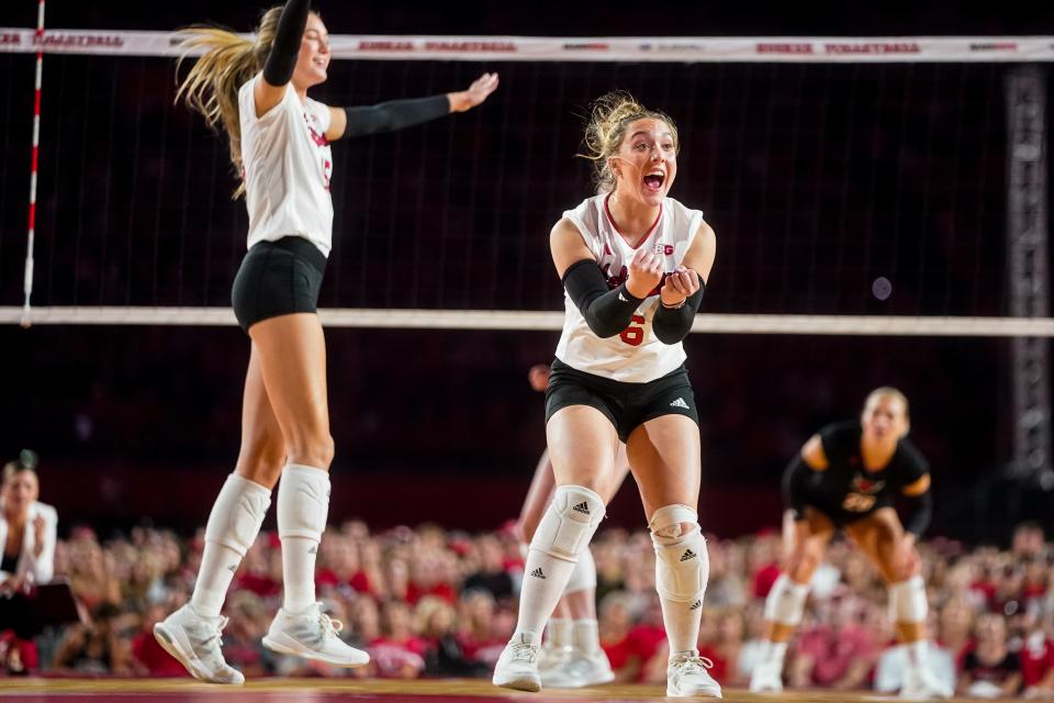 Nebraska Cornhuskers defensive specialist Laney Choboy (6) celebrates after scoring against the Omaha Mavericks during the third set at Memorial Stadium.