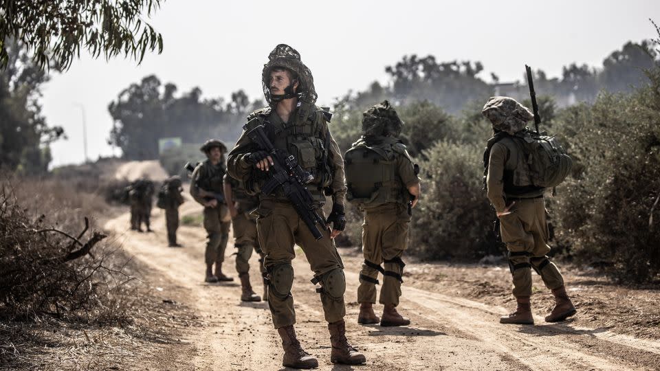 Israeli soldiers patrol near the Gaza border as the clash between Israeli army and Palestinian factions continues in Nir Oz, Israel on October 24. - Mostafa Alkharouf/Anadolu/Getty Images