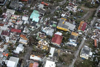 <p>Storm damage in the aftermath of Hurricane Irma, in St. Maarten. Irma cut a path of devastation across the northern Caribbean, leaving thousands homeless after destroying buildings and uprooting trees.(Photo: Gerben Van Es/Dutch Defense Ministry via AP) </p>