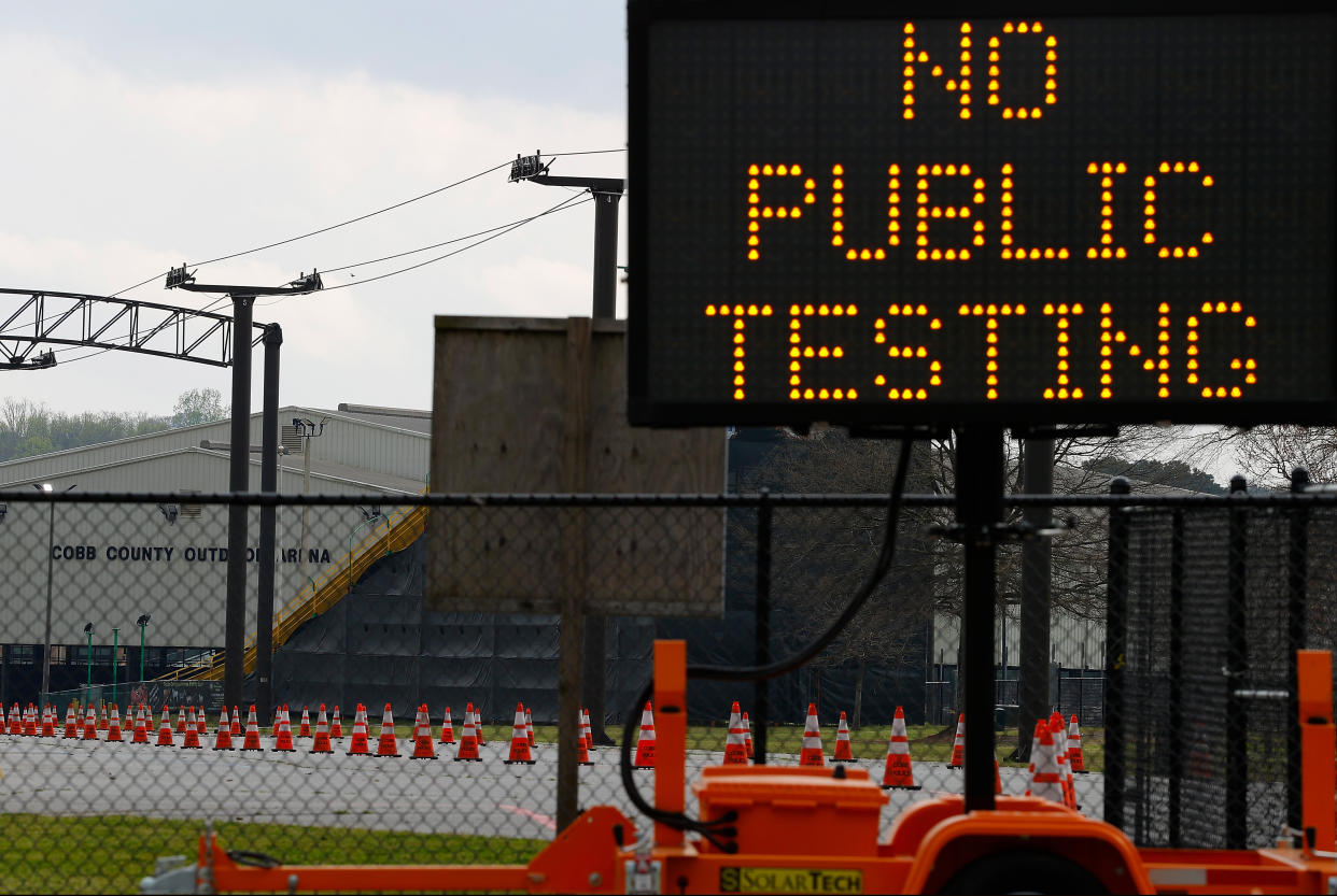 A sign is visible outside of Jim R. Miller Park during the first day of drive-thru coronavirus testing in Marietta, Georgia.  (Photo: Kevin C. Cox via Getty Images)