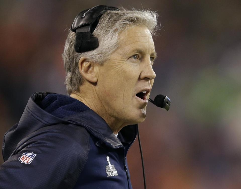 Seattle Seahawks head coach Pete Carroll looks on during the first half of the NFL Super Bowl XLVIII football game against the Denver Broncos Sunday, Feb. 2, 2014, in East Rutherford, N.J. (AP Photo/Jeff Roberson)