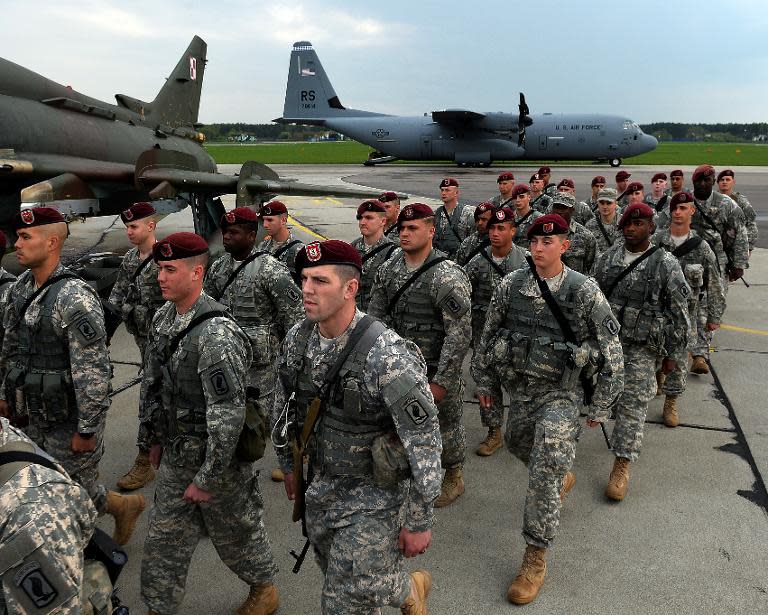 The first American troops arrive at the airport in Swidwin, Poland on April 23, 2014, after Washington said it was sending a force of 600 to the Baltic states as the crisis over Ukraine deepens