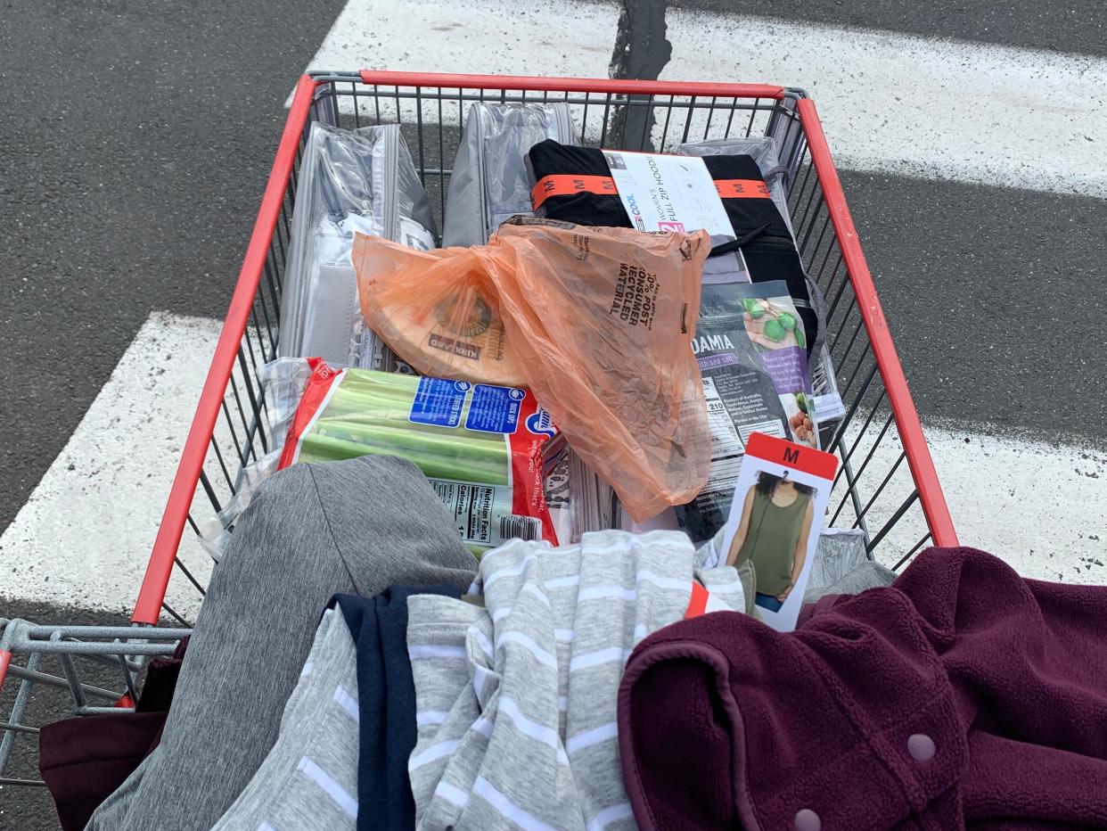 costco cart being pushed in a parking lot