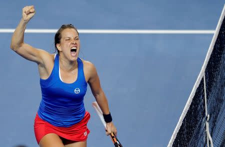 Tennis - Fed Cup Final - France v Czech Republic - Strasbourg, France - 13/11/16. Czech Republic's Barbora Strycova celebrates her victory against France's Alize Cornet. REUTERS/Vincent Kessler