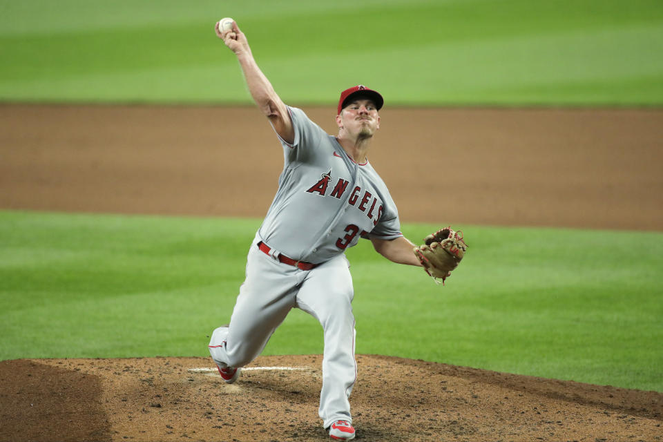 Los Angeles Angels starting pitcher Dylan Bundy throws against the Seattle Mariners during the seventh inning of a baseball game Thursday, Aug. 6, 2020, in Seattle. (AP Photo/Ted S. Warren)