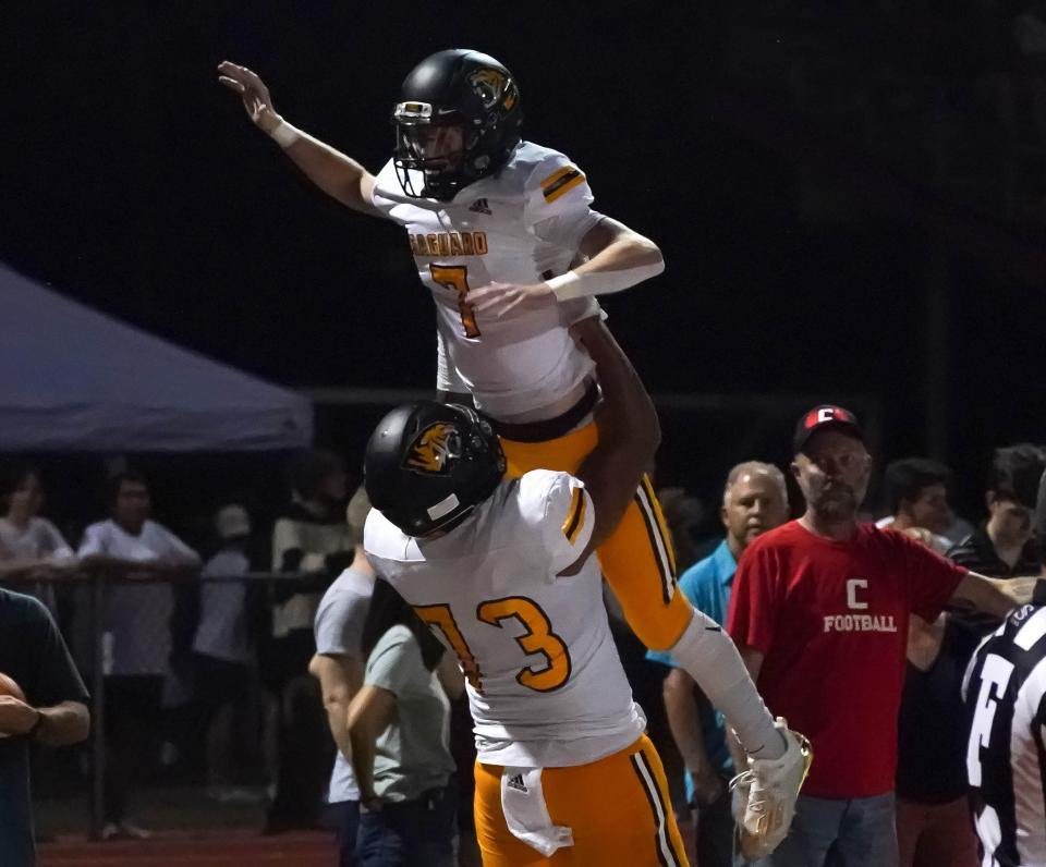 Saguaro's Cole Goodwin (7) gets lifted in the air by teammate Parker Brailsford (73) after scoring a touchdown during their game Sept, 24, 2021 in Scottsdale.  