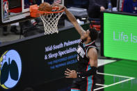 Memphis Grizzlies forward Xavier Tillman (2) dunks during the second half of the team's NBA basketball game against the Philadelphia 76ers on Saturday, Jan. 16, 2021, in Memphis, Tenn. (AP Photo/Brandon Dill)