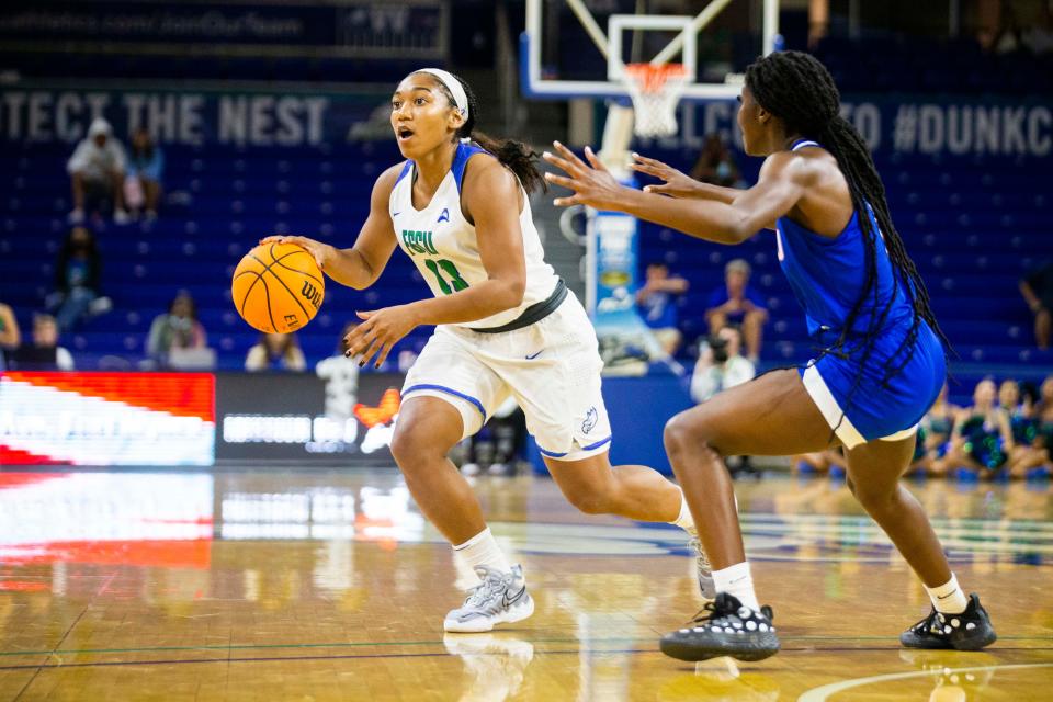 FGCU's Kerstie Phills (13) dribbles the ball during the FGCU women's basketball game against FMU on Tuesday, Nov. 9, 2021 at the Alico Arena in Fort Myers, Fla. 