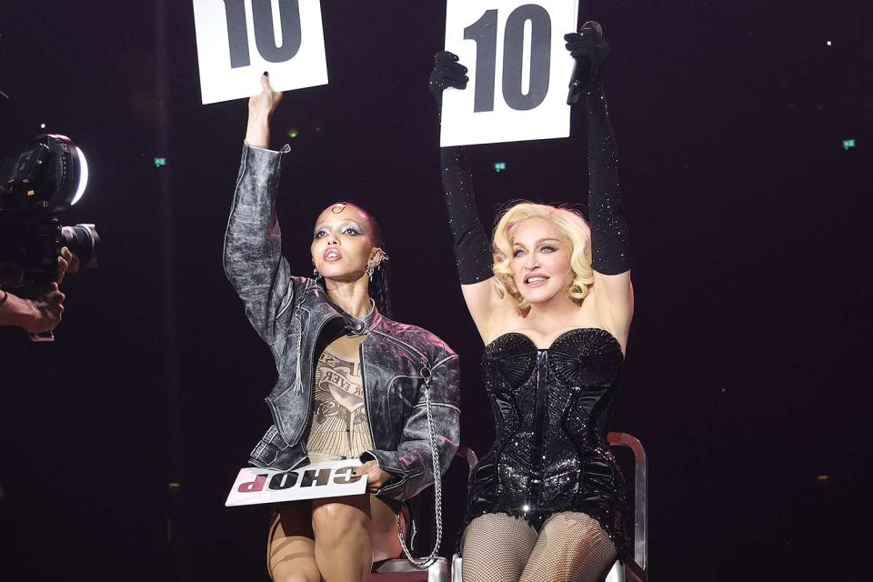 <p>Kevin Mazur/WireImage</p> FKA Twigs and Madonna perform during The Celebration Tour at The O2 Arena on Oct. 15, 2023 in London, England.