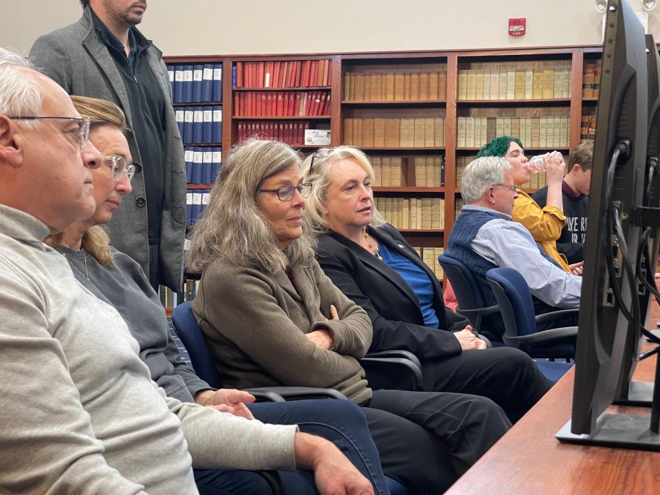 Debra Altschiller, the Democratic candidate who appears to have beaten Republican candidate Lou Gargiulo in the District 24 race for New Hampshire State Senate, watches with other observers on Tuesday, Nov. 22, 2022, during a recount in the race.