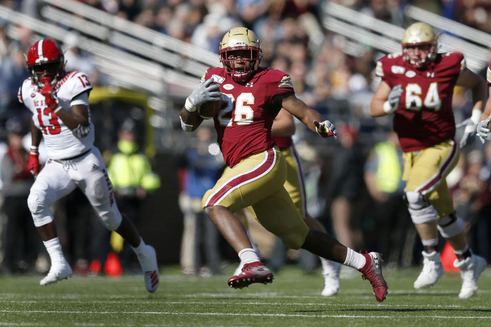 FILE - In this Oct. 19, 2019, file photo, Boston College running back David Bailey (26) carries the ball against North Carolina State during the first half of an NCAA college football game in Boston. Bailey's workload is expected to pick up in 2020, now that A.J. Dillon has left for the NFL. (AP Photo/Michael Dwyer, File)