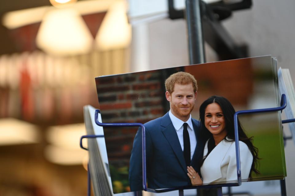 Royal memorabilia featuring Britain's Prince Harry, Duke of Sussex, and Meghan, Duchess of Sussex is displayed for sale in a store near Buckingham Palace in London on January 10, 2020. - Prince Harry's wife Meghan has returned to Canada following the couple's bombshell announcement that they were quitting their frontline royal duties, it emerged Friday, as the monarch held urgent talks with her family to resolve the crisis. (Photo by DANIEL LEAL-OLIVAS / AFP) (Photo by DANIEL LEAL-OLIVAS/AFP via Getty Images)