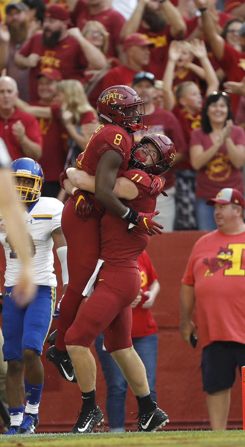 Iowa State tight end Chase Allen, right, hoists up wide receiver Deshaunte Jones, left, after Jones ran in a touchdown during the first half of an NCAA college football game, Saturday, Sept. 1, 2018, in Ames, Iowa. (AP Photo/Matthew Putney)