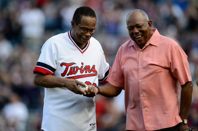 Rod Carew, left, with wife Rhonda Carew, and Tony Oliva, right