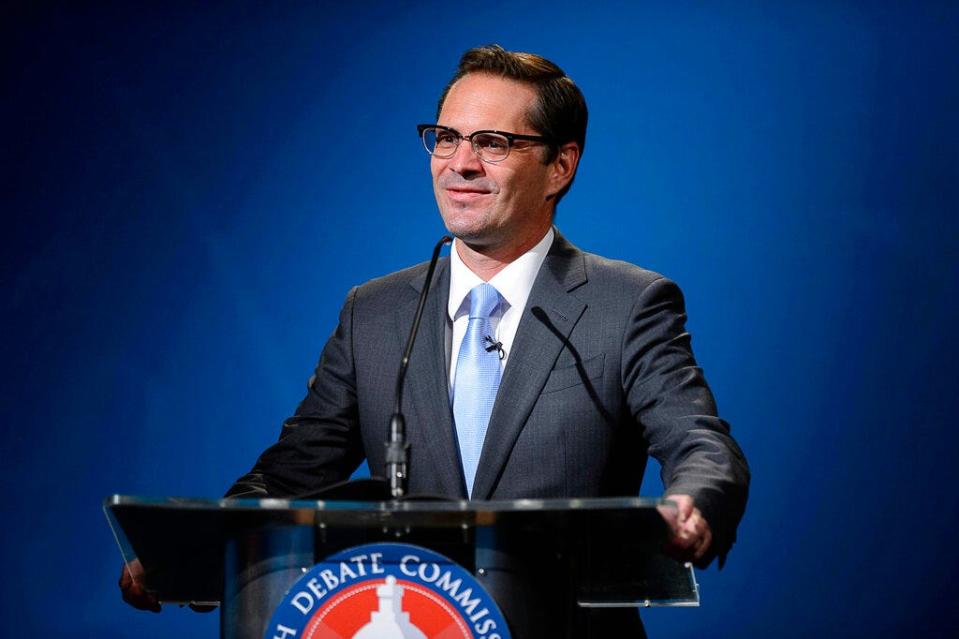 Democratic candidate Chris Peterson speaks while debating Republican Lt. Gov. Spencer Cox in Salt Lake City, Tuesday, Sept. 29, 2020. Cox went head to head with Democratic law professor Peterson in Utah's gubernatorial debate Tuesday. The two candidates are competing to succeed Republican Gov. Gary Herbert, who isn't running again after more than a decade in office.