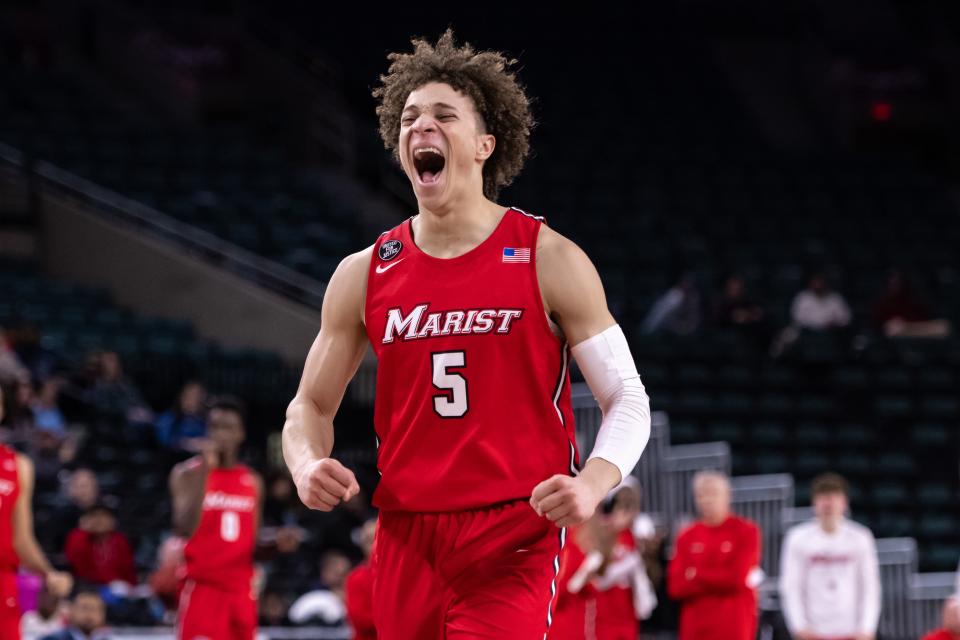 Mar 10, 2023; Atlantic City, NJ, USA; Marist Red Foxes guard Isaiah Brickner (5) reacts during the first half against the St. Peter's Peacocks at Jim Whelan Boardwalk Hall. Mandatory Credit: John Jones-USA TODAY Sports