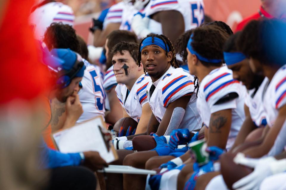 Florida Gators wide receiver Caleb Douglas (4) sits on the sidelines during the season opener at Rice-Eccles Stadium in Salt Lake City on Thursday, Aug. 31, 2023. | Megan Nielsen, Deseret News