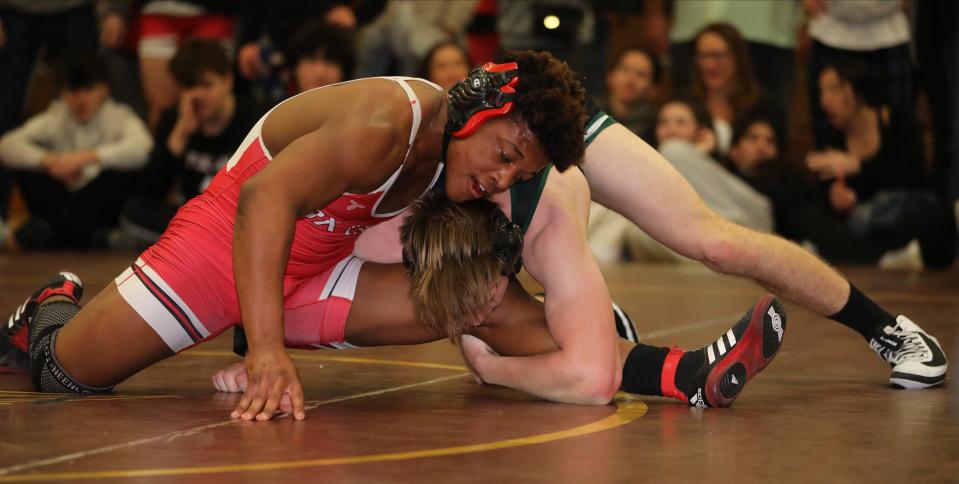 Barron Ransom from Fox Lane on his way to defeating Ronan Forde from Yorktown in the 190 pound match during the wrestling divisional at Clarkstown South High School in West Nyack, Feb. 3, 2024.