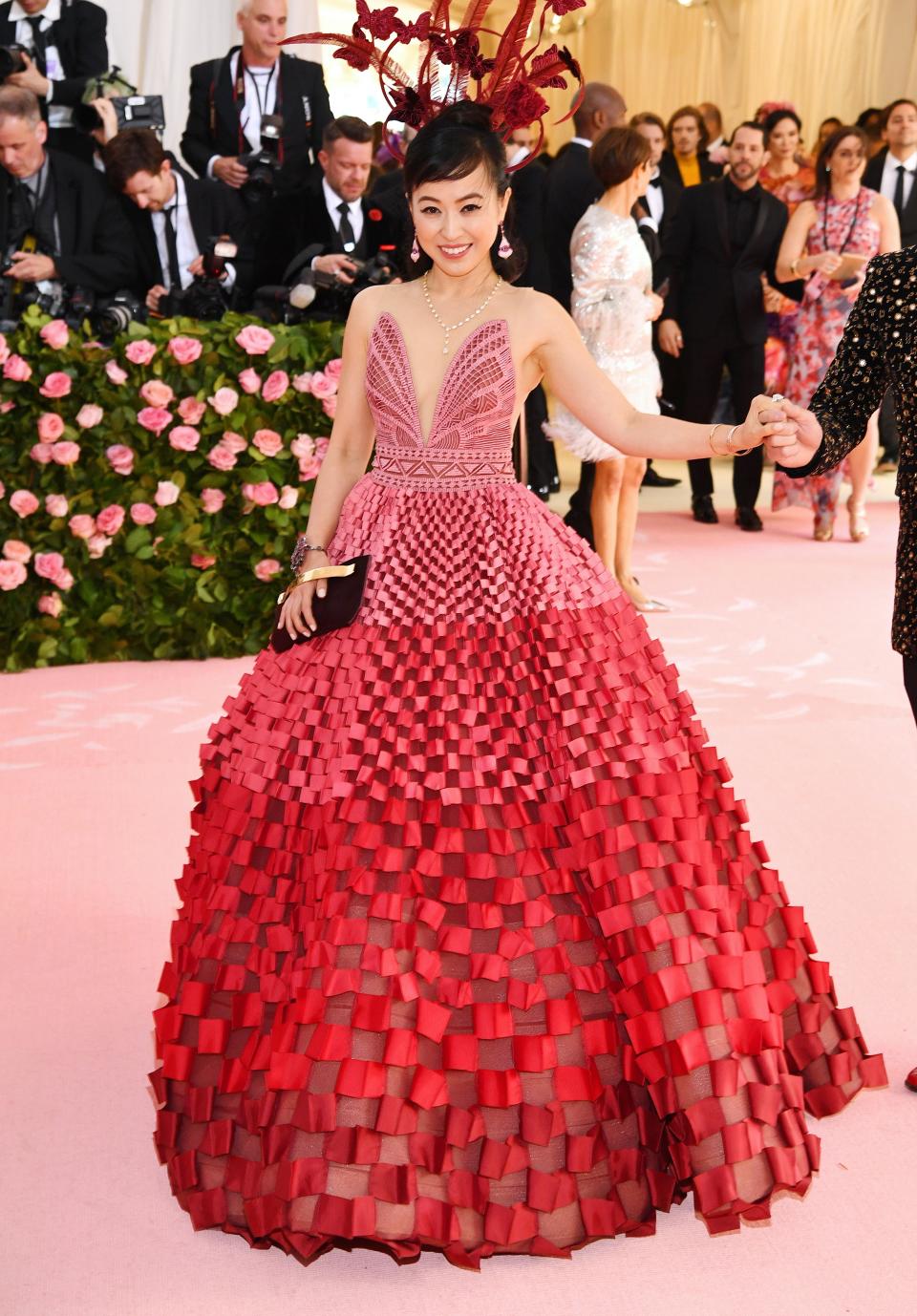 <h1 class="title">Coral Chung in Sebastian Gunawan with a custom Senreve bag and Wendy Yue earrings</h1><cite class="credit">Photo: Getty Images</cite>