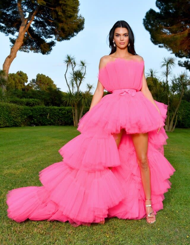 The supermodel debuts a piece from couture designer Giambattista Valli's collab with H&M at the amfAR Gala during Cannes Film Festival.