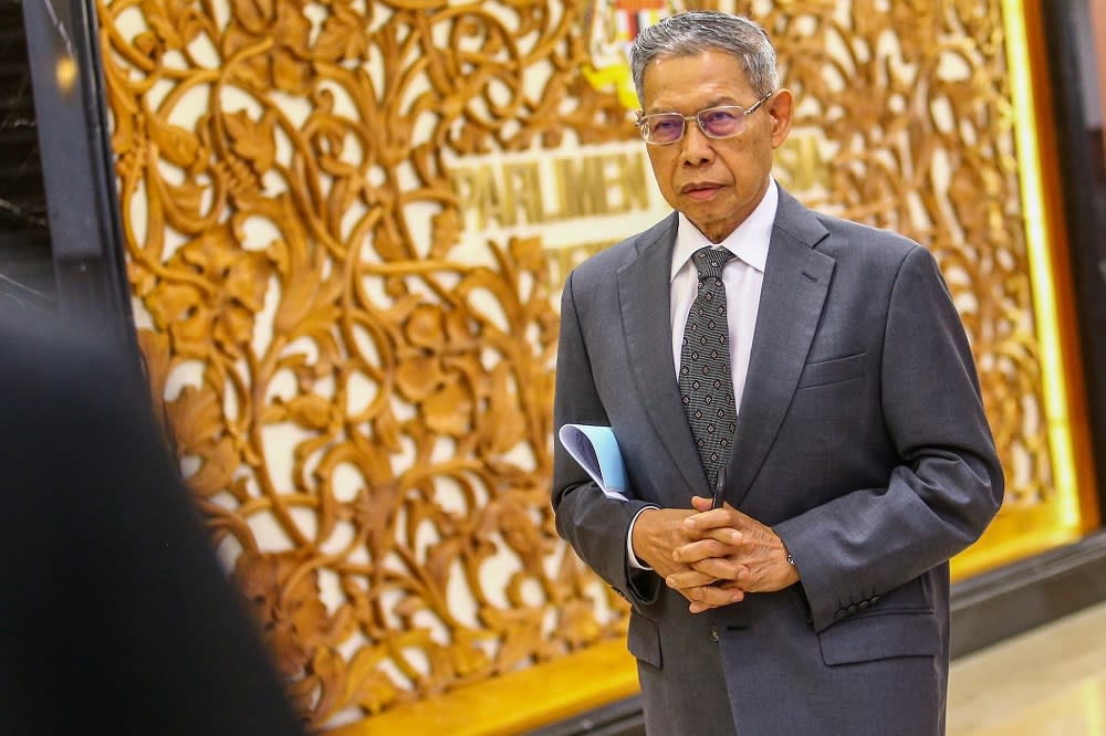 Datuk Seri Mustapa Mohamed arrives at the Parliament lobby in Kuala Lumpur July 8, 2019. — Picture by Hari Anggara