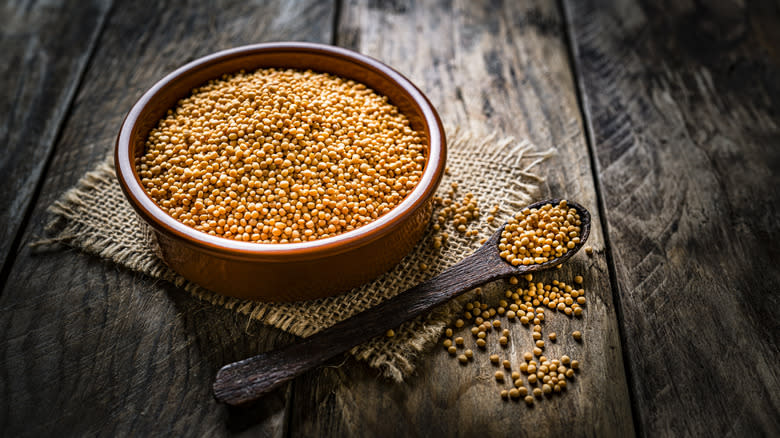 Mustard seed on wood