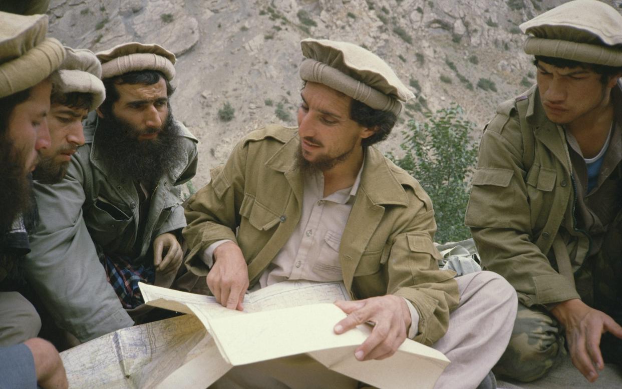 Ahmad Shah Massoud (centre) led a band of mujahideen fighters - Sandy Gall