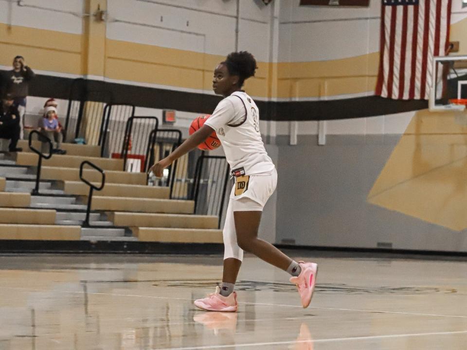 Stagg junior guard Jameelah Pharms dribbles the ball up the court during a game in the 2022-23 season.