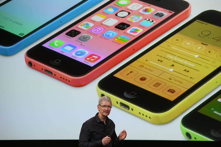 Apple CEO Tim Cook speaks about the new iPhone on September 10, 2013 in Cupertino, California