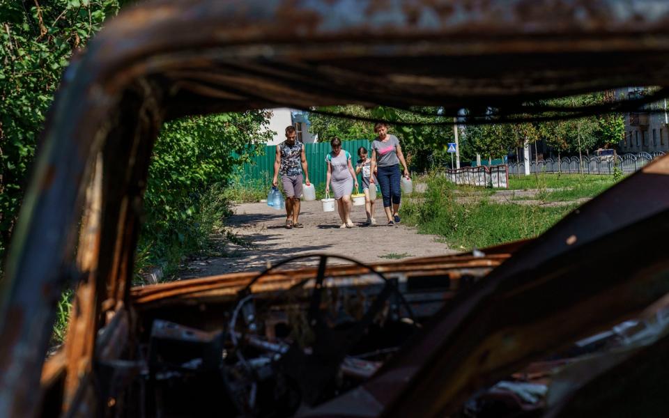 Ukraine war: Russia 'using landmines that maim children who mistake them for toys' - David Goldman /AP