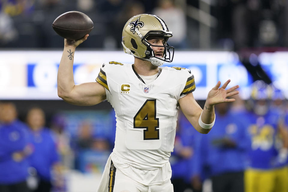 New Orleans Saints quarterback Derek Carr (4) throws a pass during the first half of an NFL football game against the Los Angeles Rams, Thursday, Dec. 21, 2023, in Inglewood, Calif. (AP Photo/Ryan Sun)