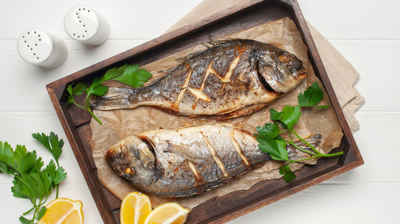 Baked whole fish on tray