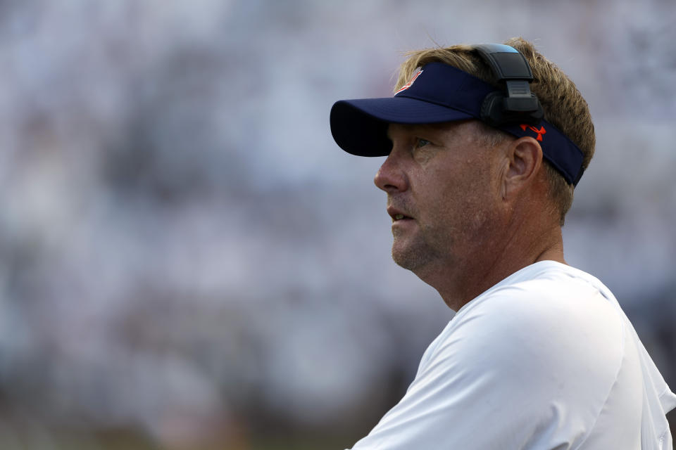 Auburn head coach Hugh Freeze watches the second half of an NCAA college football game against Massachusetts, Saturday, Sept. 2, 2023, in Auburn, Ala. (AP Photo/Butch Dill)