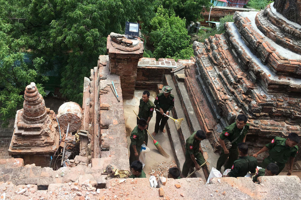 <p>Military personnel clear debris at a temple that was damaged by a strong earthquake in Bagan, Myanmar, Thursday, Aug. 25, 2016. (AP Photo/Min Kyi Thein) </p>