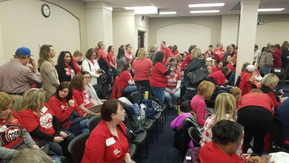 Educators and supporters gathered inside the Capitol Annex in Frankfort for the House State Government Committee meeting Thursday. Some teachers in the state staged a “sick out” and forced schools to close over a proposed bill that would eliminate educator control of a board overseeing investments for the Teacher Retirement System.