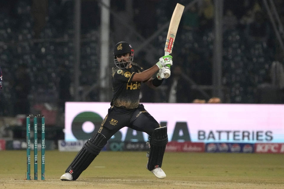 Peshawar Zalmi' Babar Azam plays a shot during the Pakistan Super League T20 cricket match between Peshawar Zalmi and Islamabad United, in Lahore, Pakistan, Monday, Feb. 26, 2024. (AP Photo/K.M. Chaudary)