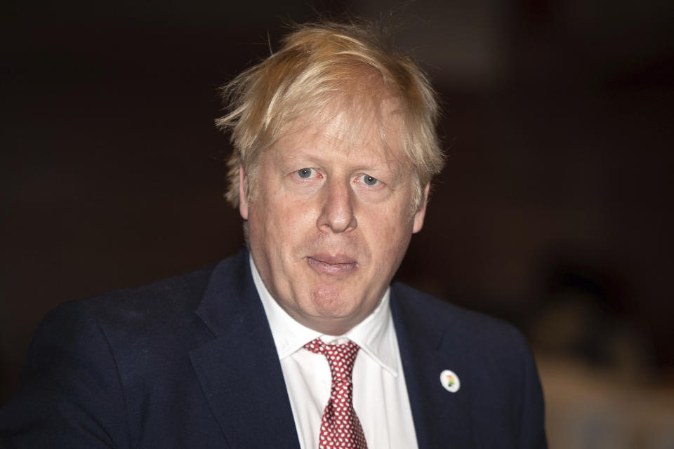 Britain's Prime Minister Boris Johnson at the UK Africa Investment Summit in London, Monday Jan. 20, 2020. Boris Johnson is hosting 54 African heads of state or government in London. The move comes as the U.K. prepares for post-Brexit dealings with the world. (Leon Neal/Pool via AP)