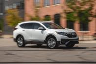 <p>The 2022 Honda CR-V won't accelerate anyone's heart rate, but its capacious interior and fuel-efficient powertrains make it a compelling compact crossover. In fact, it's one of our favorites, earning a spot on our <a href="https://www.caranddriver.com/features/a38873223/2022-editors-choice/" rel="nofollow noopener" target="_blank" data-ylk="slk:2022 Editors' Choice list;elm:context_link;itc:0;sec:content-canvas" class="link ">2022 Editors' Choice list</a>. The <a href="https://www.caranddriver.com/honda" rel="nofollow noopener" target="_blank" data-ylk="slk:Honda;elm:context_link;itc:0;sec:content-canvas" class="link ">Honda</a> isn't necessarily fun to drive, and neither its standard turbocharged gas engine nor the hybrid model qualifies as quick, but it steers and stops without any fuss. Its ride is also relaxing on long hauls, just go easy on the gas to avoid the base engine's noisy drone. Family road trips will also require fewer fill-ups than many other SUVs thanks to the CR-V's noteworthy fuel economy. A host of standard active safety features and popular tech options help it compete with newer rivals. While the 2022 CR-V isn't the flashiest or classiest in this hotly contested segment, it's still one of the most satisfying and talented entrants.<br></p><p><a class="link " href="https://www.caranddriver.com/honda/cr-v" rel="nofollow noopener" target="_blank" data-ylk="slk:Review, Pricing, and Specs;elm:context_link;itc:0;sec:content-canvas">Review, Pricing, and Specs</a></p>