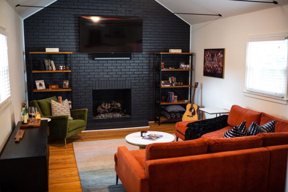 a living room with a fireplace