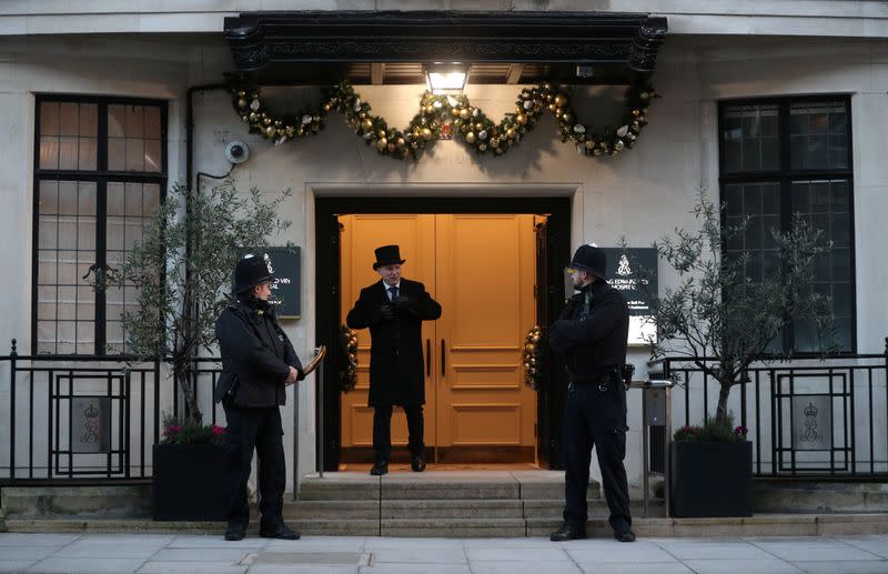 Police officers stand outside King Edward VII's Hospital, where Britain's Prince Philip was admitted, in London