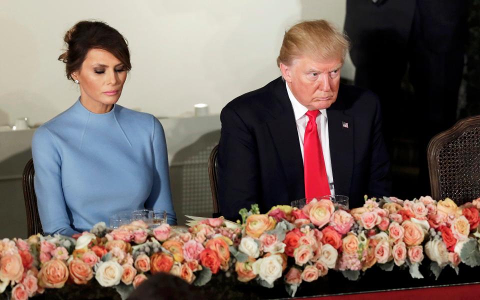 President Donald Trump and First Lady Melania on inauguration day  - Credit: YURI GRIPAS 